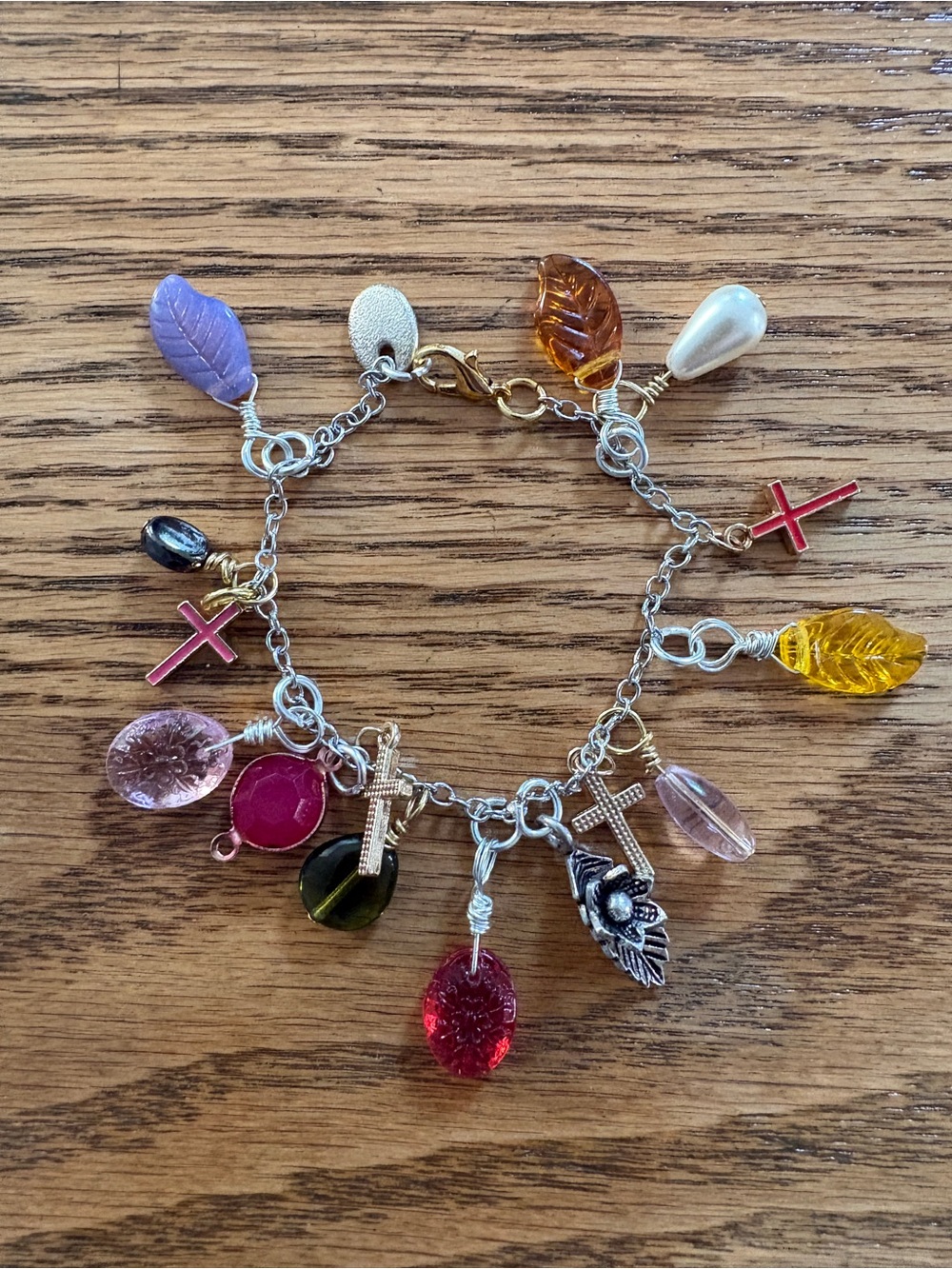 Hand Crafted Multi-Color Glass Charm Bracelet with Cross and Leaf Charms